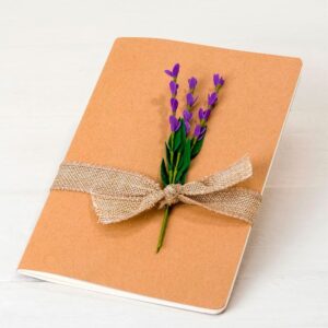 Libreta con cierre, estampado floral y diseño de llama en 4 colores